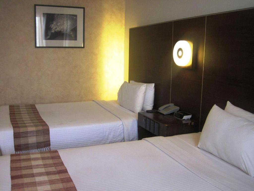Casablanca Suites Legazpi Buitenkant foto